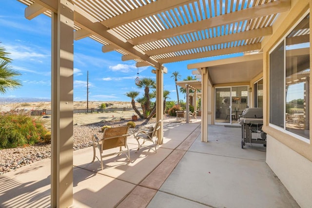 view of patio featuring a pergola and grilling area