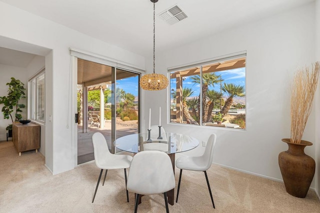 view of carpeted dining room