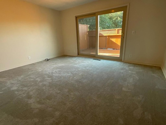 view of carpeted spare room