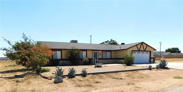 ranch-style home with a garage