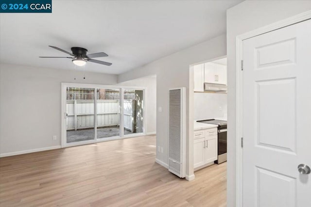 interior space featuring ceiling fan and light hardwood / wood-style flooring