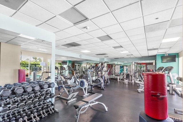 exercise room with a drop ceiling