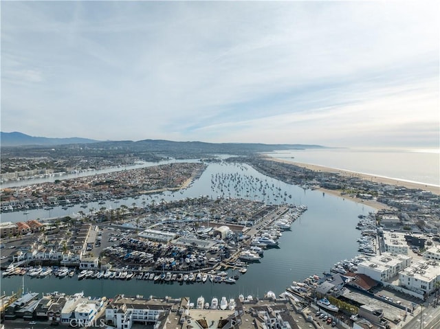 bird's eye view with a water and mountain view