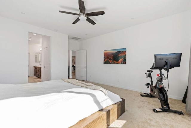 bedroom featuring carpet, connected bathroom, and ceiling fan