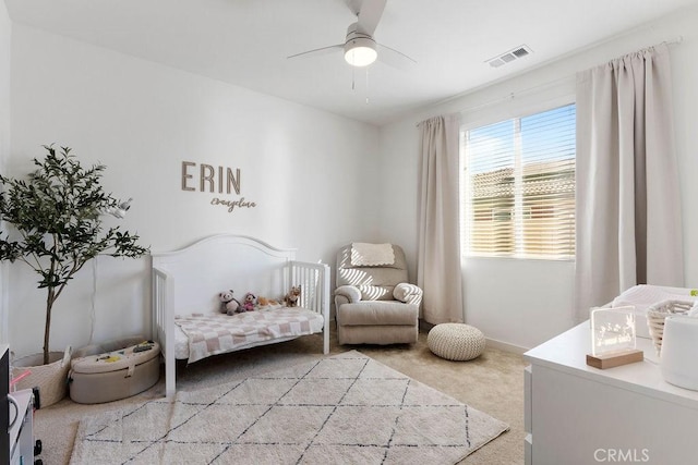 carpeted bedroom with ceiling fan