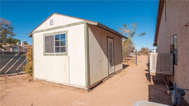 view of outbuilding with central AC unit