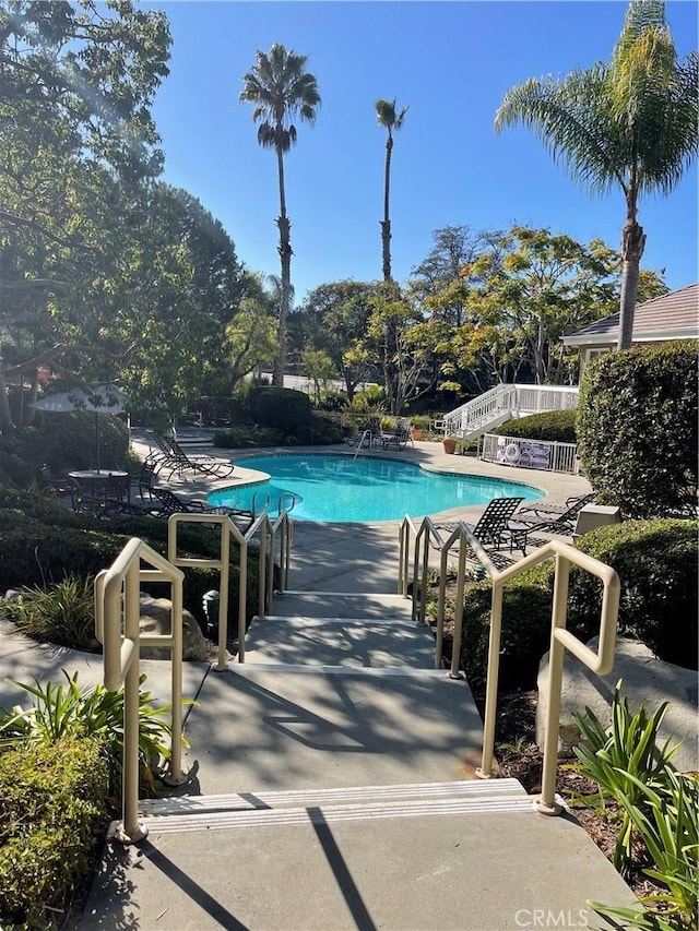 view of pool with a patio area