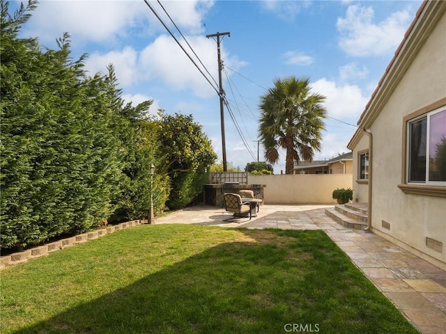 view of yard with a patio