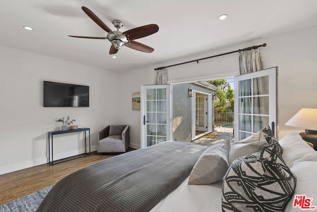 bedroom with hardwood / wood-style floors, access to outside, and ceiling fan