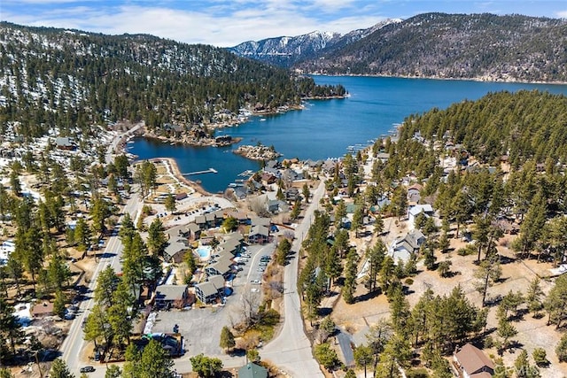 aerial view featuring a water and mountain view