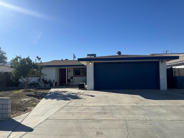 ranch-style home with a garage