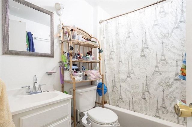 full bathroom featuring vanity, toilet, and shower / tub combo with curtain