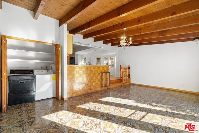 kitchen with wooden ceiling, beam ceiling, a notable chandelier, and washing machine and clothes dryer