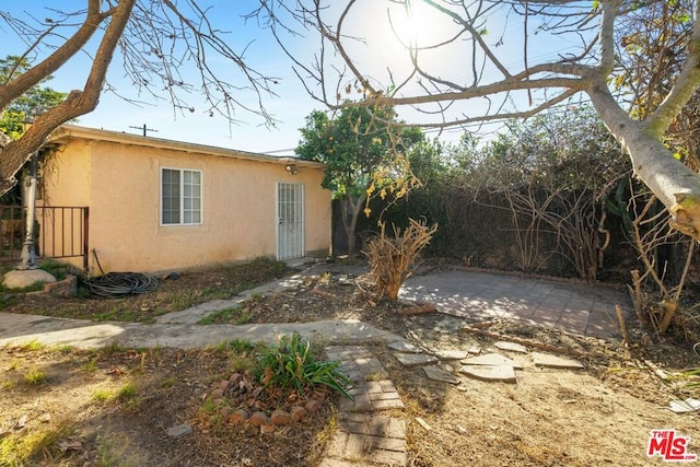 exterior space with a patio area