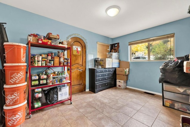 miscellaneous room featuring light tile patterned floors