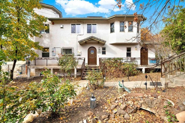 34667 Navajo Rd, Julian, CA 92036 - view of front of property featuring stucco siding, a wooden deck, stairway, and fence