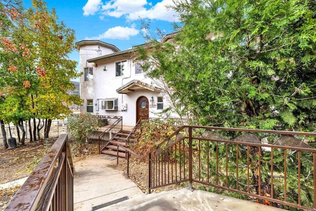 34667 Navajo Rd, Julian, CA 92036 - mediterranean / spanish-style house featuring stucco siding, stairs, and fence