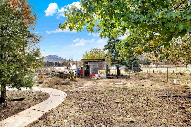 34667 Navajo Rd, Julian, CA 92036 - view of yard featuring a mountain view, fence, and an outdoor structure