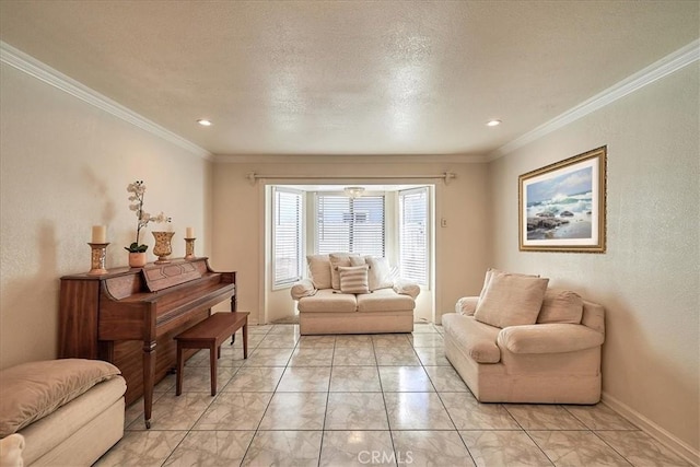 sitting room with a textured ceiling and crown molding