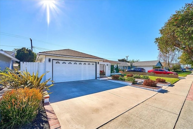 single story home with a garage