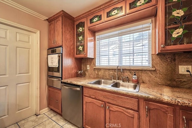 kitchen featuring decorative backsplash, stainless steel appliances, ornamental molding, and sink