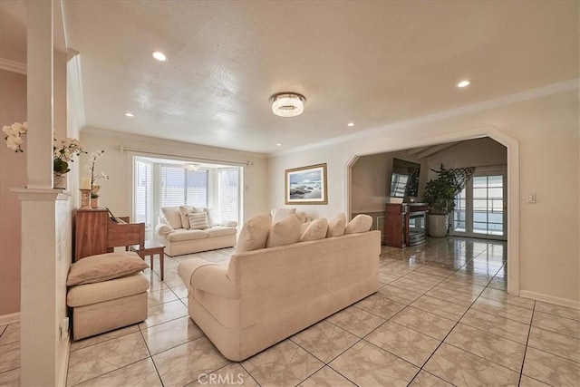 living room with ornamental molding