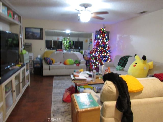 living room with ceiling fan