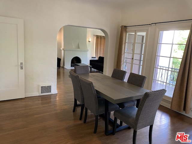 dining space featuring dark hardwood / wood-style floors