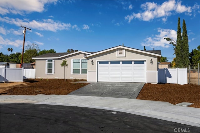 ranch-style house featuring a garage