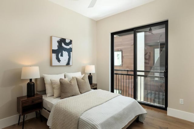 bedroom with ceiling fan and hardwood / wood-style floors