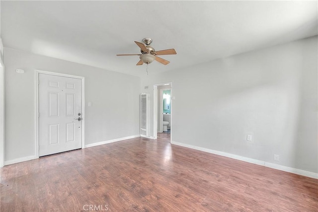 unfurnished room featuring wood-type flooring and ceiling fan