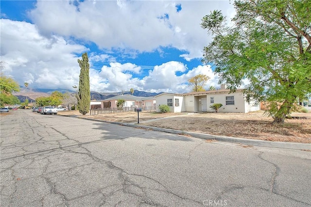 view of front of property featuring a mountain view