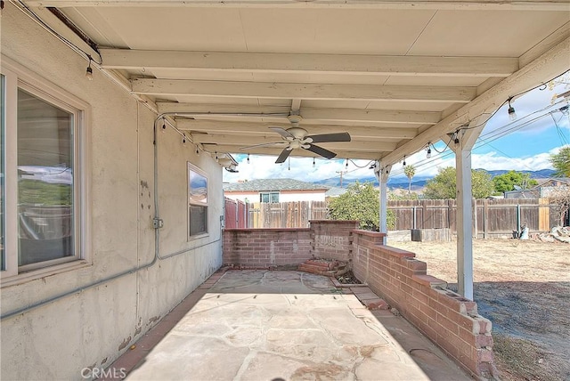 view of patio / terrace featuring ceiling fan