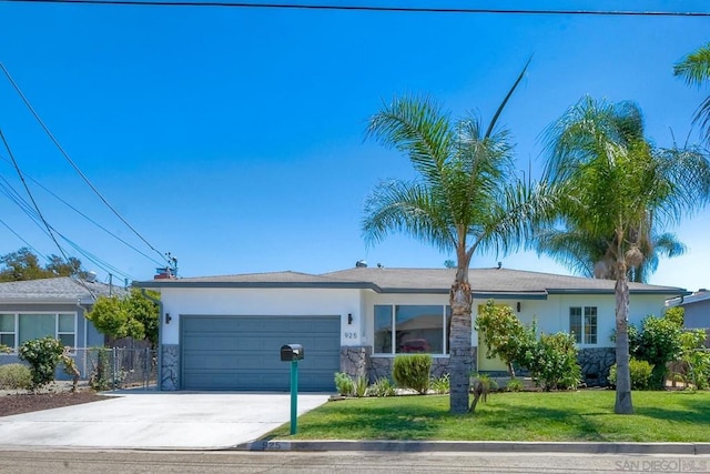 single story home with a front yard and a garage