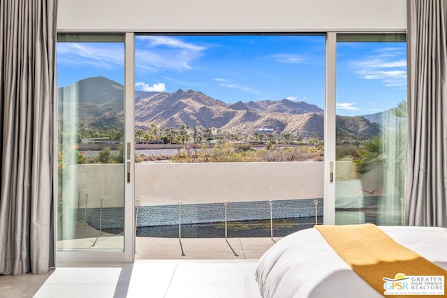 bedroom with a mountain view