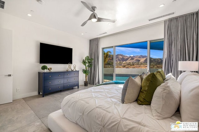 bedroom featuring ceiling fan and access to outside