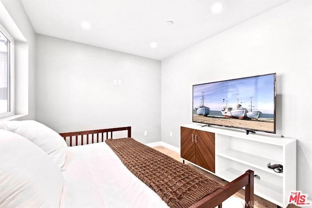 bedroom featuring hardwood / wood-style floors