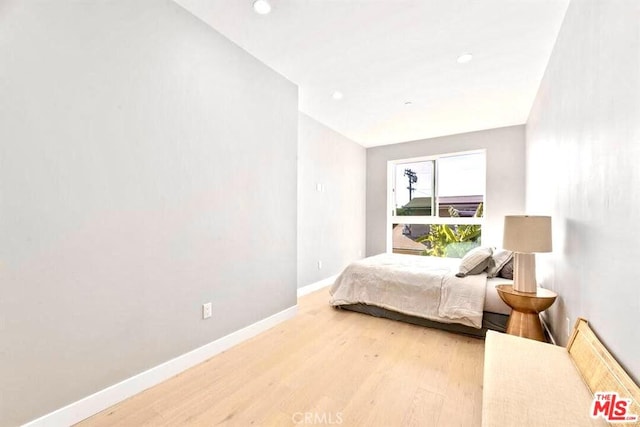 bedroom featuring light wood-type flooring