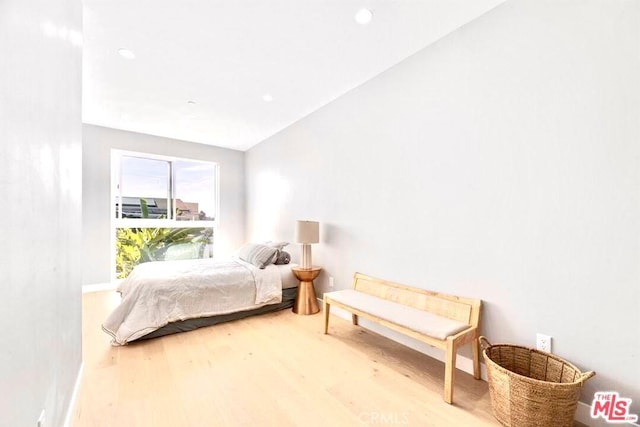 bedroom featuring light wood-type flooring