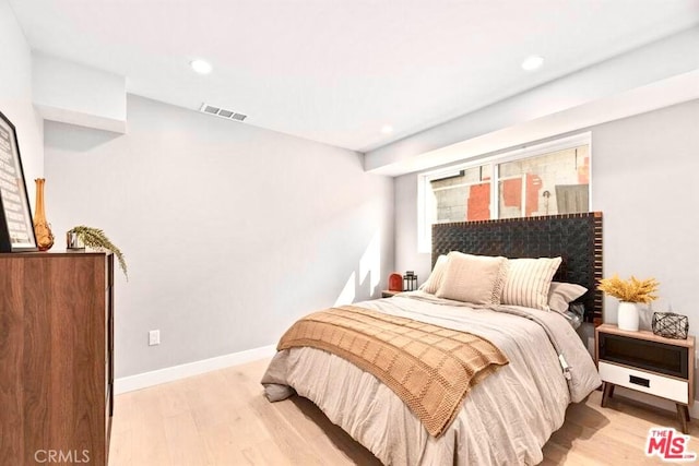 bedroom featuring light wood-type flooring