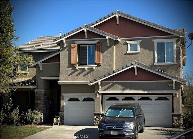 view of front of property with a garage