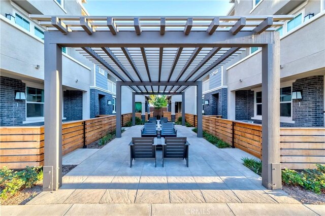 view of patio / terrace featuring a pergola