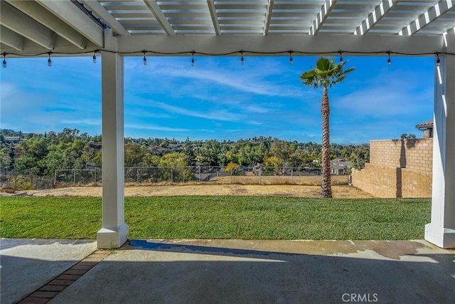 view of yard with a patio area and a pergola