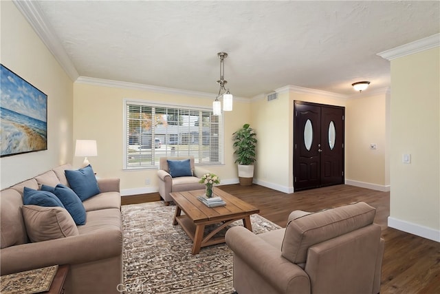 living room with dark hardwood / wood-style floors and ornamental molding