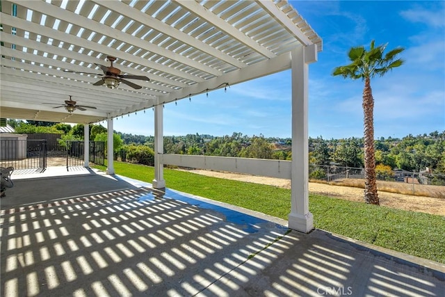 view of patio / terrace featuring a pergola and ceiling fan