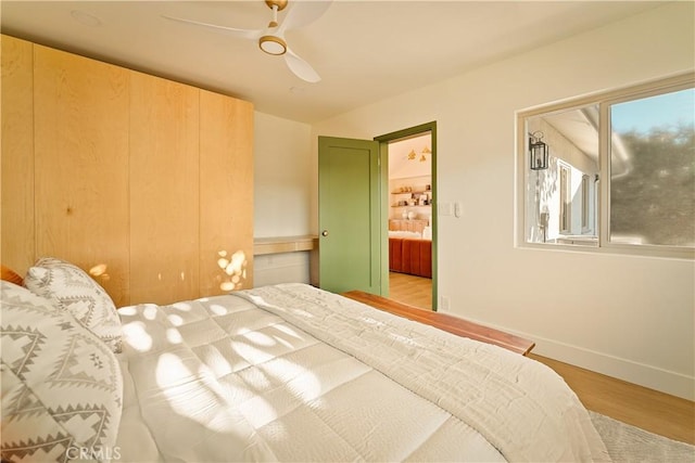 unfurnished bedroom featuring light hardwood / wood-style floors and ceiling fan