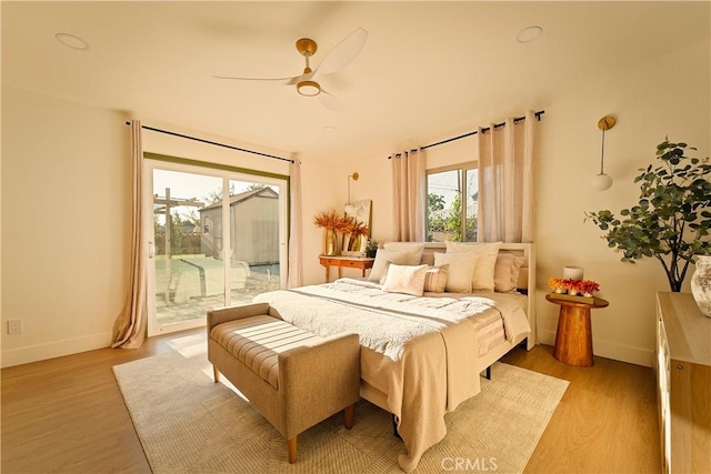 bedroom with ceiling fan, access to exterior, and light wood-type flooring