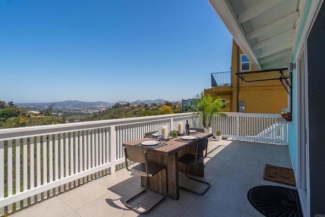 balcony featuring a mountain view