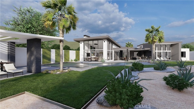 back of house with a patio, a sunroom, and a lawn