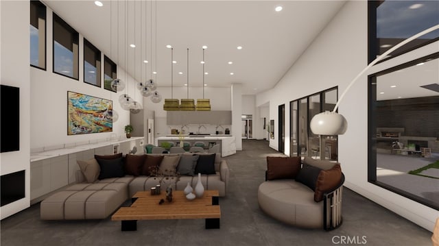 living room with a high ceiling